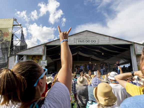 A crowd cheers for a Cajun band at a fais do do.