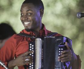 Cedric Watson playing accordion