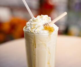 A portrait of a honey-drizzled frappe at Tamp &amp; Grind Coffee in Alexandria.