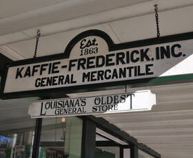 A sign advertising Kaffie Fredericks General Store in Nachitoches as Louisiana’s oldest general store.