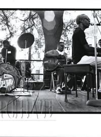 Professor Longhair plays the piano in this black-and-white film photo, circa 1970s.