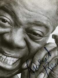 Signed photo of Louis Armstrong