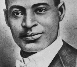 A portrait Buddy Bolden in white tie, gazing to the photographer's right